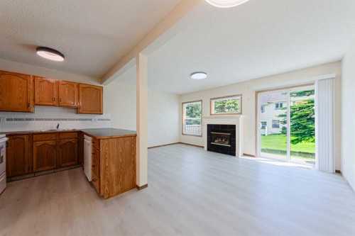 88 Country Hills Villas Nw, Calgary, AB - Indoor With Fireplace