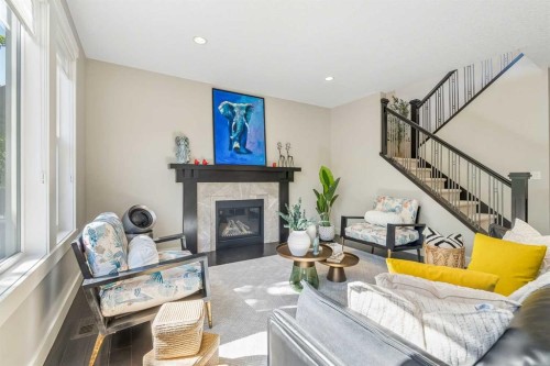 30 Ascot Crescent Sw, Calgary, AB - Indoor Photo Showing Living Room With Fireplace