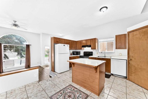 6934 Laguna Way Ne, Calgary, AB - Indoor Photo Showing Kitchen