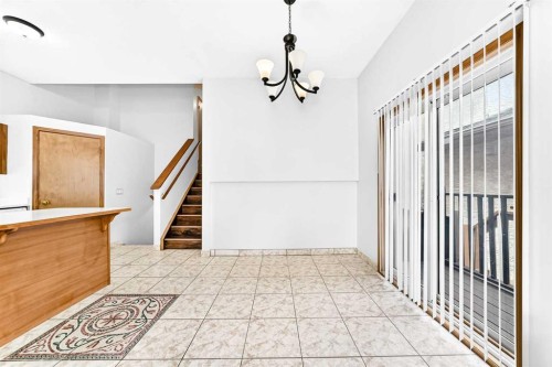 6934 Laguna Way Ne, Calgary, AB - Indoor Photo Showing Other Room