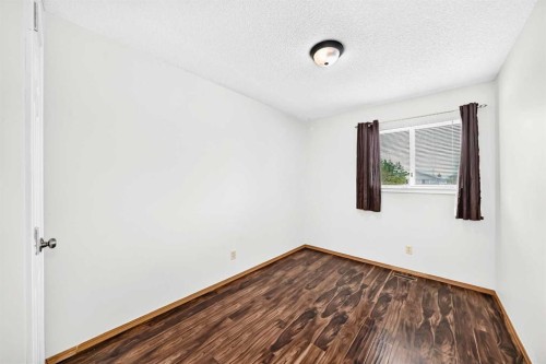 6934 Laguna Way Ne, Calgary, AB - Indoor Photo Showing Other Room