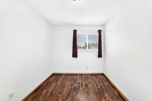 6934 Laguna Way Ne, Calgary, AB - Indoor Photo Showing Other Room
