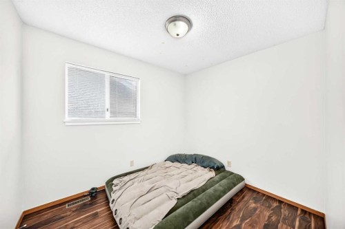 6934 Laguna Way Ne, Calgary, AB - Indoor Photo Showing Bedroom
