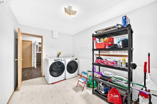 6934 Laguna Way Ne, Calgary, AB - Indoor Photo Showing Laundry Room