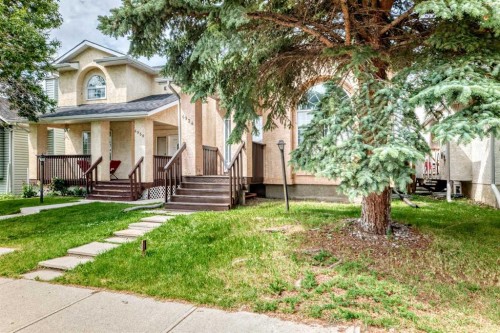 6934 Laguna Way Ne, Calgary, AB - Outdoor With Deck Patio Veranda With Facade