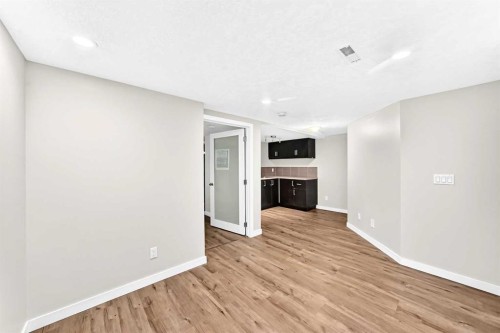 6934 Laguna Way Ne, Calgary, AB - Indoor Photo Showing Other Room