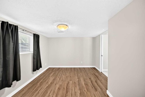 6934 Laguna Way Ne, Calgary, AB - Indoor Photo Showing Other Room