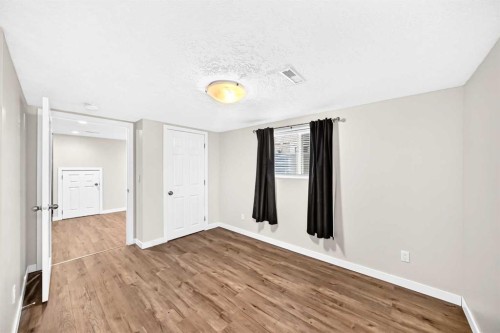 6934 Laguna Way Ne, Calgary, AB - Indoor Photo Showing Other Room