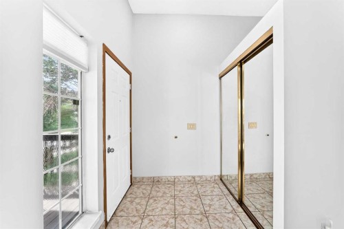 6934 Laguna Way Ne, Calgary, AB - Indoor Photo Showing Other Room
