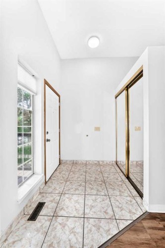 6934 Laguna Way Ne, Calgary, AB - Indoor Photo Showing Other Room