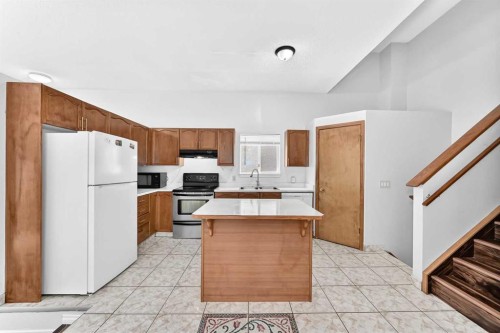 6934 Laguna Way Ne, Calgary, AB - Indoor Photo Showing Kitchen