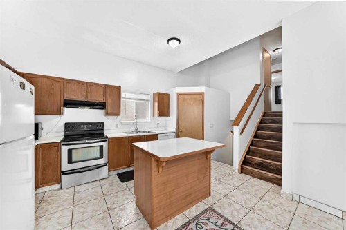 6934 Laguna Way Ne, Calgary, AB - Indoor Photo Showing Kitchen