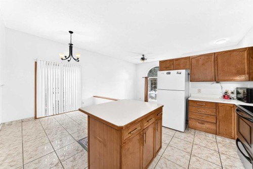 6934 Laguna Way Ne, Calgary, AB - Indoor Photo Showing Kitchen