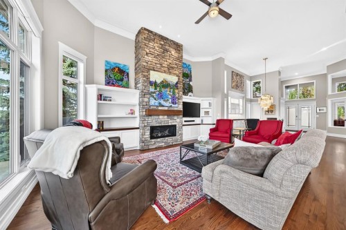 148 Scenic Ridge Crescent Nw, Calgary, AB - Indoor Photo Showing Living Room With Fireplace