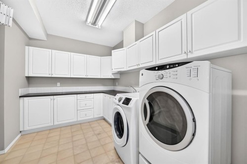 148 Scenic Ridge Crescent Nw, Calgary, AB - Indoor Photo Showing Laundry Room