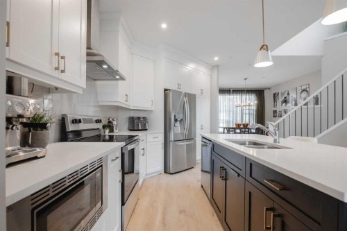 44 Calhoun Common Ne, Calgary, AB - Indoor Photo Showing Kitchen With Double Sink With Upgraded Kitchen
