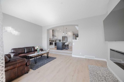 44 Calhoun Common Ne, Calgary, AB - Indoor Photo Showing Living Room With Fireplace