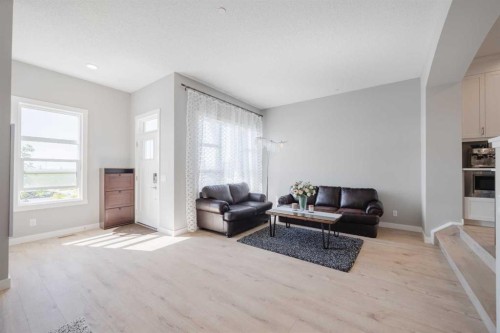 44 Calhoun Common Ne, Calgary, AB - Indoor Photo Showing Living Room