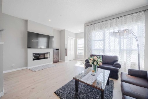 44 Calhoun Common Ne, Calgary, AB - Indoor Photo Showing Living Room With Fireplace