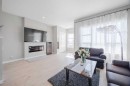 44 Calhoun Common Ne, Calgary, AB  - Indoor Photo Showing Living Room With Fireplace 