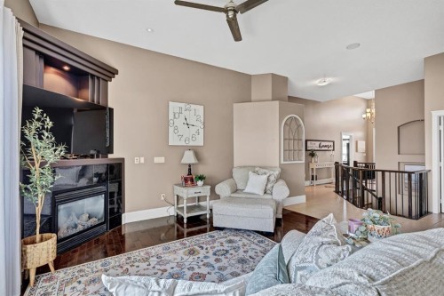 9 Liberty Place, Sylvan Lake, AB - Indoor Photo Showing Living Room With Fireplace