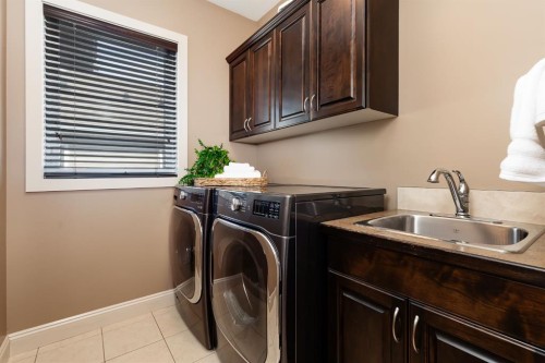 9 Liberty Place, Sylvan Lake, AB - Indoor Photo Showing Laundry Room