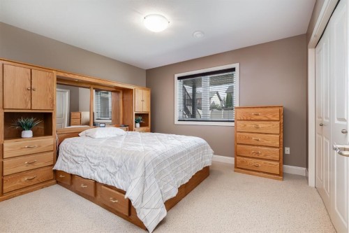 9 Liberty Place, Sylvan Lake, AB - Indoor Photo Showing Bedroom