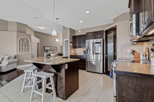 9 Liberty Place, Sylvan Lake, AB - Indoor Photo Showing Kitchen With Stainless Steel Kitchen With Upgraded Kitchen