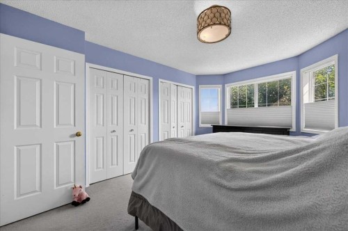 95 Hidden Point Nw, Calgary, AB - Indoor Photo Showing Bedroom