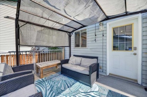 95 Hidden Point Nw, Calgary, AB - Outdoor With Deck Patio Veranda With Exterior