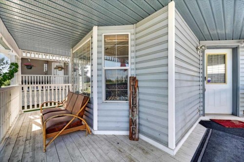95 Hidden Point Nw, Calgary, AB - Outdoor With Deck Patio Veranda With Exterior