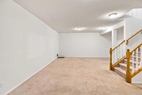 21 Scimitar Heath Nw, Calgary, AB - Indoor Photo Showing Other Room