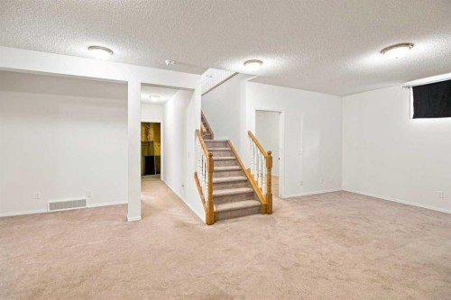 21 Scimitar Heath Nw, Calgary, AB - Indoor Photo Showing Other Room