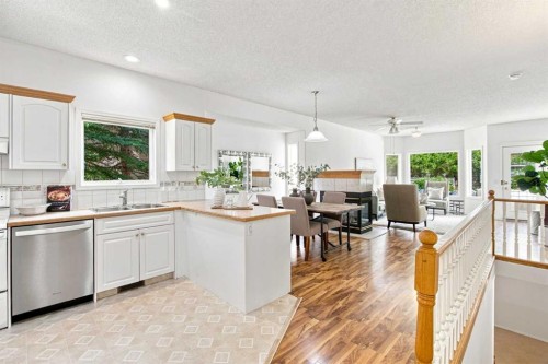 21 Scimitar Heath Nw, Calgary, AB - Indoor Photo Showing Kitchen With Double Sink