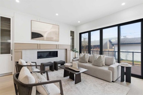 218 19 Avenue Nw, Calgary, AB - Indoor Photo Showing Living Room With Fireplace