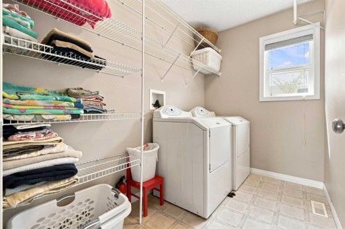 5355 Copperfield Gate Se, Calgary, AB - Indoor Photo Showing Laundry Room