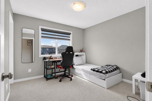 1079  Lanark Boulevard Se, Airdrie, AB - Indoor Photo Showing Other Room