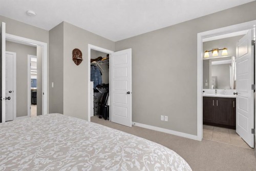 1079  Lanark Boulevard Se, Airdrie, AB - Indoor Photo Showing Bedroom