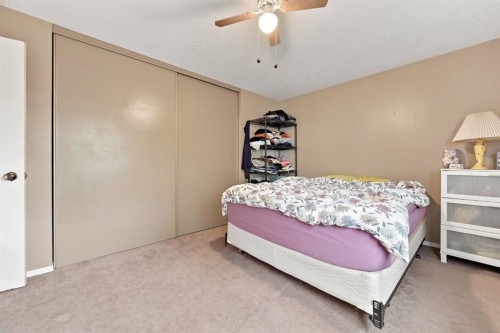 55 Macewan Park Way Nw, Calgary, AB - Indoor Photo Showing Bedroom