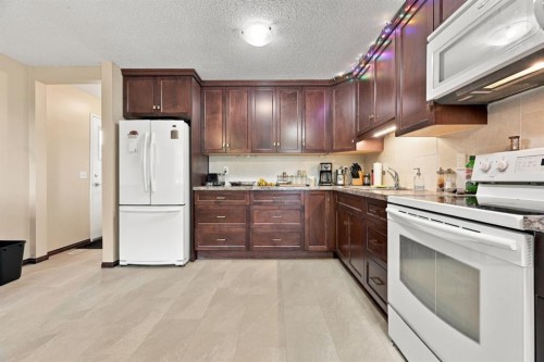 55 Macewan Park Way Nw, Calgary, AB - Indoor Photo Showing Kitchen