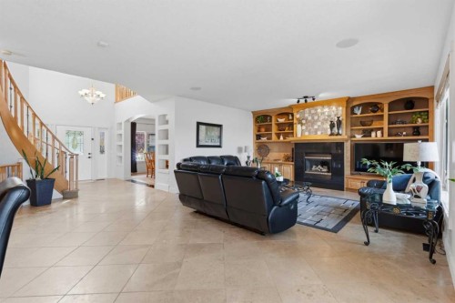 39 Chapala Terrace Se, Calgary, AB - Indoor Photo Showing Living Room With Fireplace