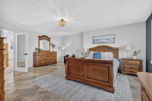 39 Chapala Terrace Se, Calgary, AB - Indoor Photo Showing Bedroom