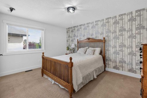 39 Chapala Terrace Se, Calgary, AB - Indoor Photo Showing Bedroom