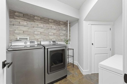 39 Chapala Terrace Se, Calgary, AB - Indoor Photo Showing Laundry Room
