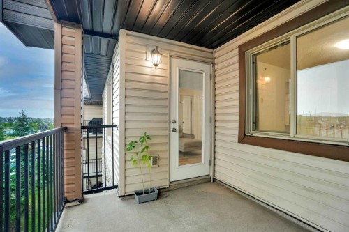1407-8 Bridlecrest Drive Sw, Calgary, AB - Outdoor With Balcony With Exterior