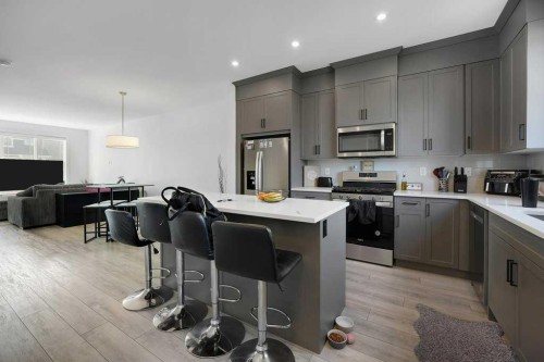 20 Amblefield Avenue Nw, Calgary, AB - Indoor Photo Showing Kitchen With Upgraded Kitchen