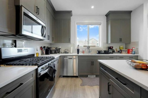 20 Amblefield Avenue Nw, Calgary, AB - Indoor Photo Showing Kitchen