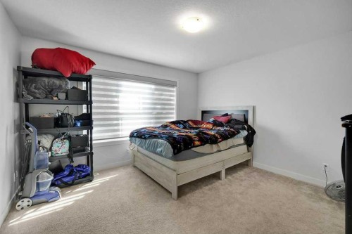 20 Amblefield Avenue Nw, Calgary, AB - Indoor Photo Showing Bedroom