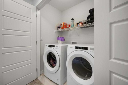 20 Amblefield Avenue Nw, Calgary, AB - Indoor Photo Showing Laundry Room