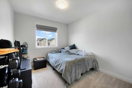 20 Amblefield Avenue Nw, Calgary, AB - Indoor Photo Showing Bedroom
